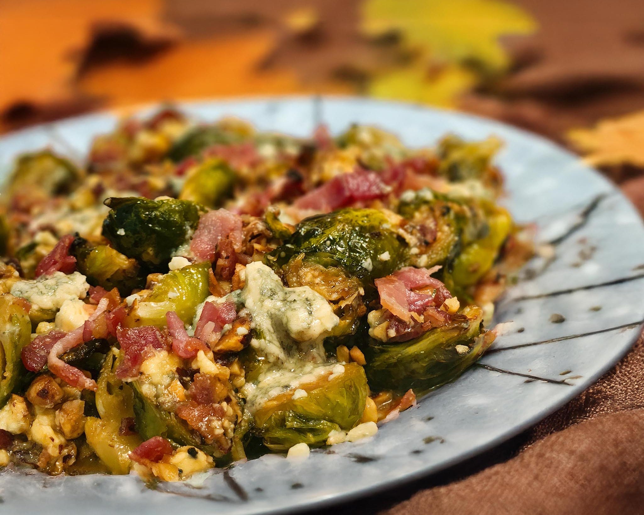 Brussels Sprouts with Candied Hazelnuts, Roquefort, and Bacon