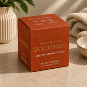 Close-up of Goldswarm raw honey to-go packets box showing fold, snap, squeeze one-hand opening instructions